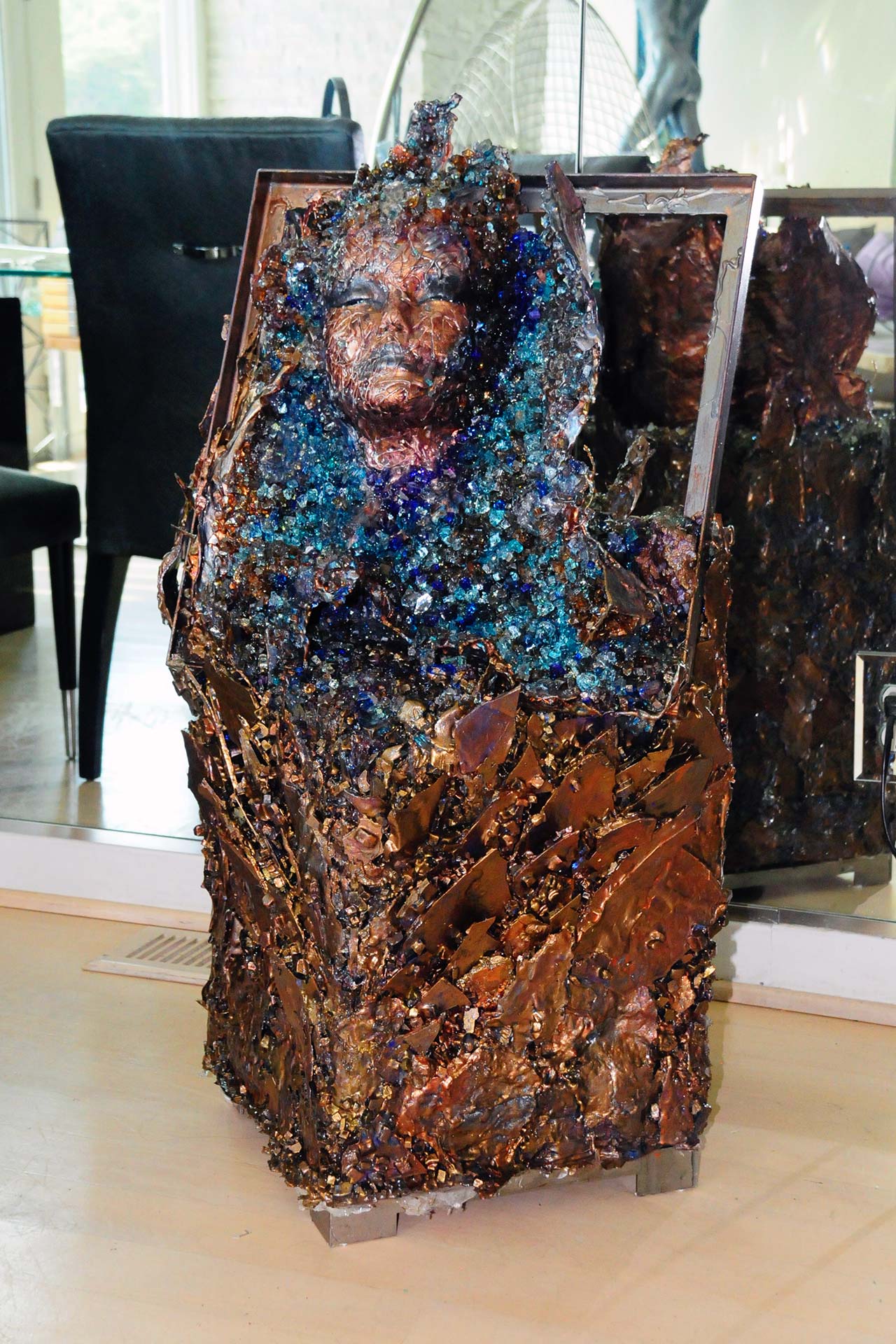 resin geode sculpture copper face