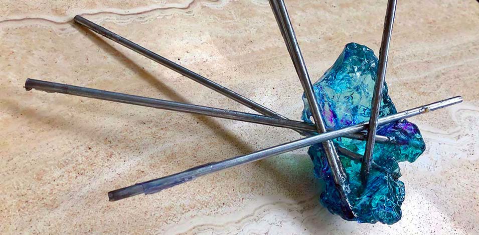Metal and dyed resin sculpture
